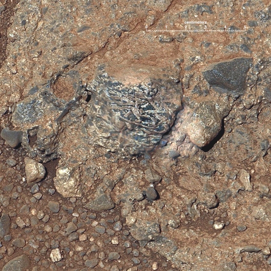 This rock - dubbed Harrison - contains light and dark-colored crystals. Image Credit: NASA/JPL-Caltech/LANL/CNES/IRAP/LPGNa