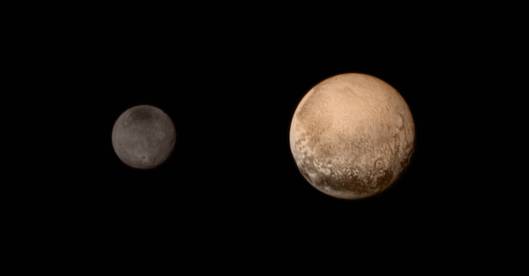 A portrait from the final approach. Pluto and Charon display striking color and brightness contrast in this composite image from July 11, showing high-resolution black-and-white LORRI images colorized with Ralph data collected from the last rotation of Pluto. Color data being returned by the spacecraft now will update these images, bringing color contrast into sharper focus. Image credit: NASA/JHUAPL/SWRI