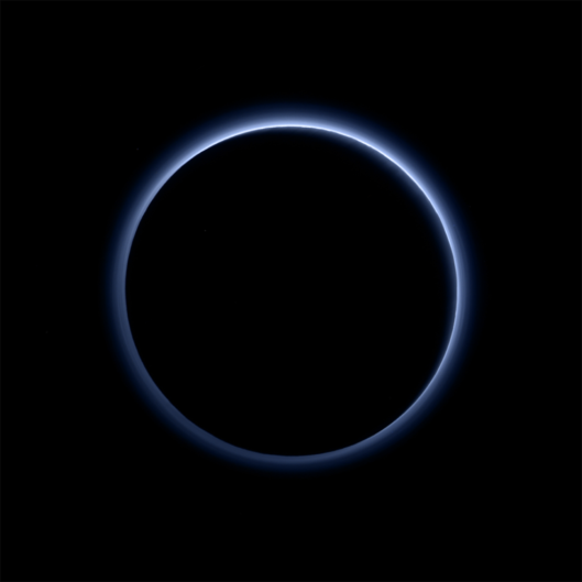 Pluto’s blue haze is thought to be similar to that seen at Saturn’s moon Titan. Photo and caption courtesy of NASA/JHUAPL/SwRI